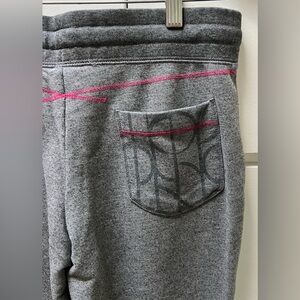 Lucy sweatpants with adorable pink details, 2 front & 1 back pocket in size XS.
